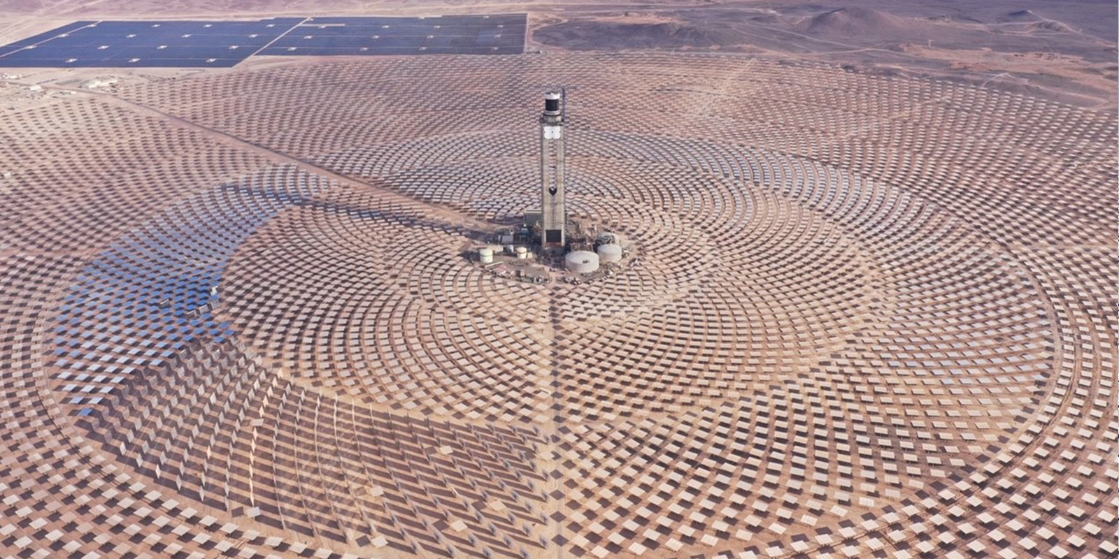 A 240-meter solar thermal tower surrounded by mirrors in Latin America